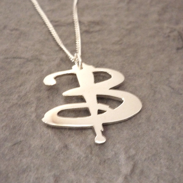 Sterling silver Handmade B-uffy pendant