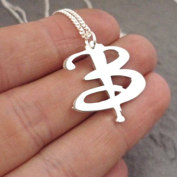 Sterling silver Handmade B-uffy pendant